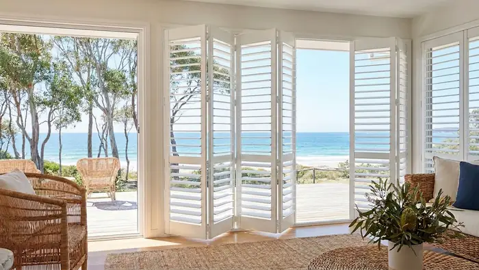 Bi-fold shutters across a wide opening