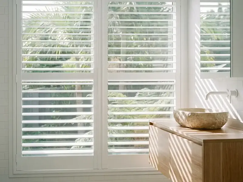 Waterproof PVC window shutters in an ensuite